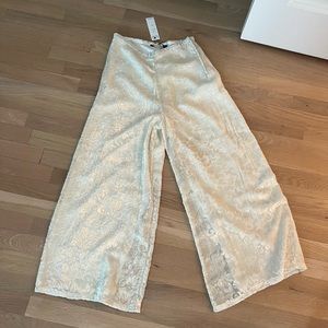 Super fun white velvet burnout cropped pants by KAS New York